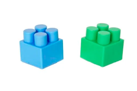 Details of a children's plastic constructor on a white background. colored cu Stock Photos