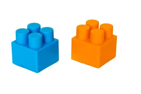 Details of a children's plastic constructor on a white background. colored cu Stock Photos