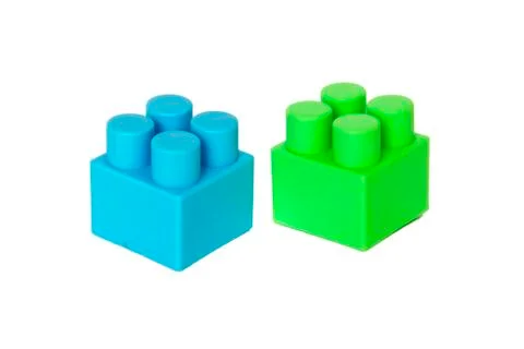 Details of a children's plastic constructor on a white background. colored cu Stock Photos