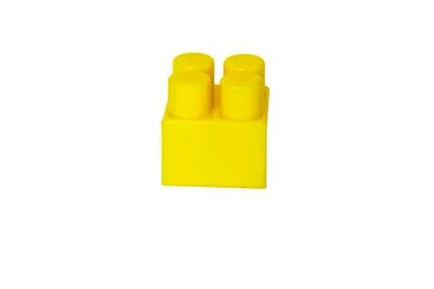 Details of a children's plastic constructor on a white background. colored cu Stock Photos