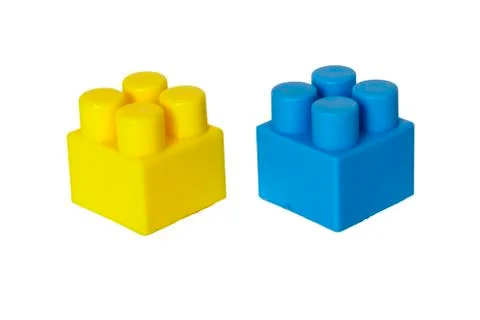 Details of a children's plastic constructor on a white background. colored cu Stock Photos