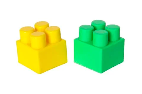 Details of a children's plastic constructor on a white background. colored cu Foto stock
