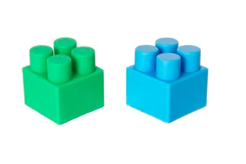 Details of a children's plastic constructor on a white background. colored cu Stock Photos