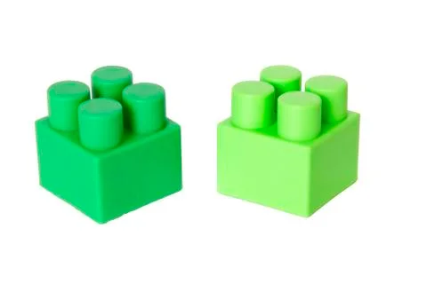Details of a children's plastic constructor on a white background. colored cu Stock Photos