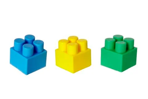 Details of a children's plastic constructor on a white background. colored cu Foto stock