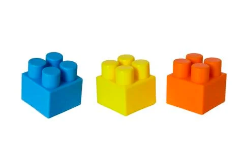 Details of a children's plastic constructor on a white background. colored cu Stock Photos