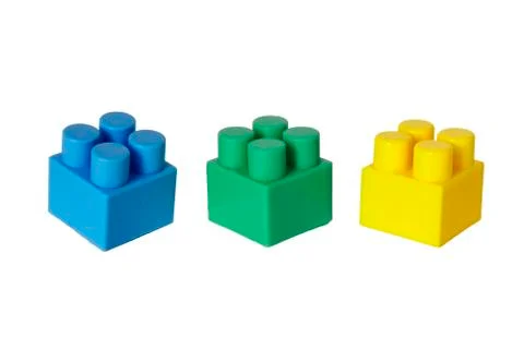 Details of a children's plastic constructor on a white background. colored cu Stock Photos
