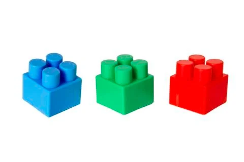 Details of a children's plastic constructor on a white background. colored cu Stock Photos