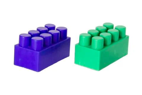 Details of a children's plastic constructor on a white background. colored cu Stock Photos