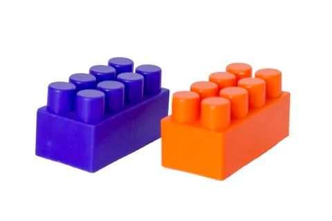 Details of a children's plastic constructor on a white background. colored cu Stock Photos