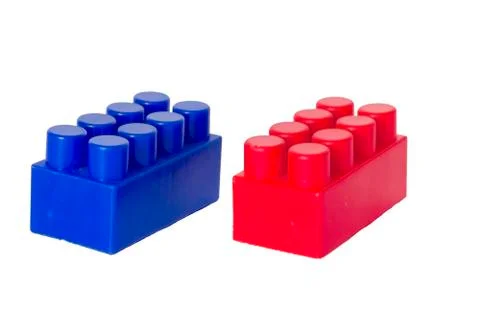 Details of a children's plastic constructor on a white background. colored cu Stock Photos