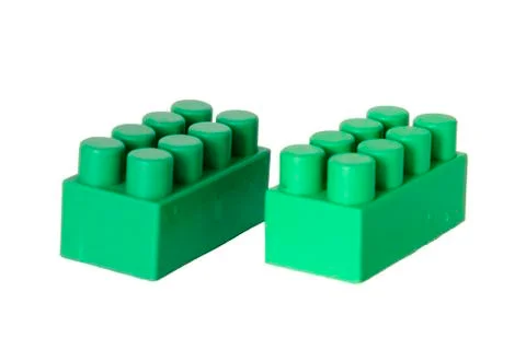 Details of a children's plastic constructor on a white background. colored cu Stock Photos