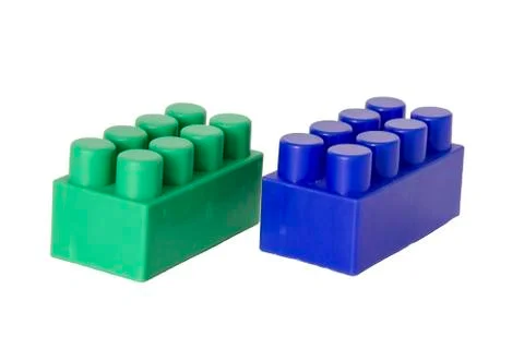 Details of a children's plastic constructor on a white background. colored cu Stock Photos