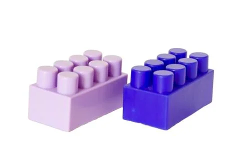 Details of a children's plastic constructor on a white background. colored cu Stock Photos