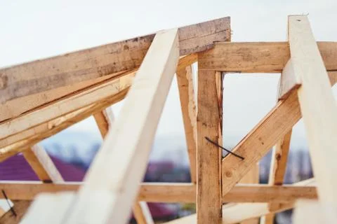 Details of construction site, timber structure of truss roof system. Stock Photos