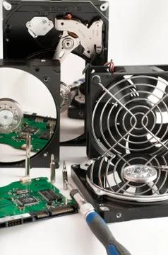 Details of hard disk drive open and a fan Stock Photos