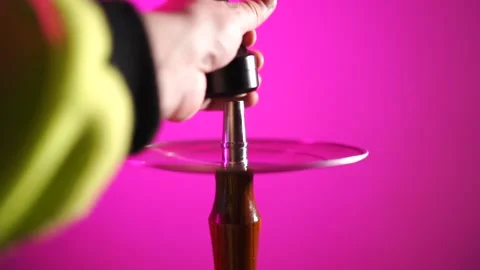 Details of a hookah on a pink background Stock Footage 171762114
