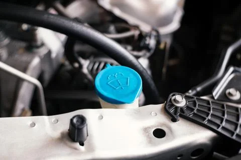 Details of modern car engine, windshield washer tank sign Stock Photos
