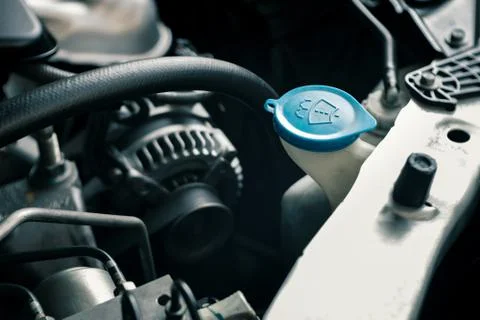 Details of modern car engine, windshield washer tank sign on cap Stock-Fotos