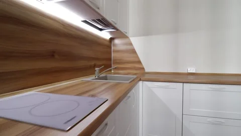 Details of a modern light kitchen in motion . View of the bright kitchen Video stock 141004739