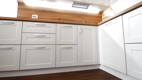 Details of a modern light kitchen in motion . View of the bright kitchen Video stock 141004910