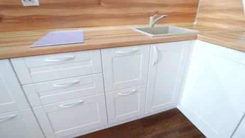Details of a modern light kitchen in motion . View of the bright kitchen Video stock 141004968