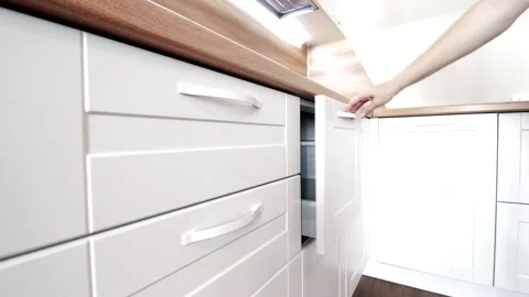 Details of a modern light kitchen in motion . View of the bright kitchen Video stock 141005196