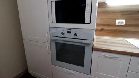 Details of a modern light kitchen in motion . View of the bright kitchen Video stock 141005412