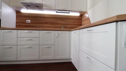 Details of a modern light kitchen in motion . View of the bright kitchen Video stock 141005504