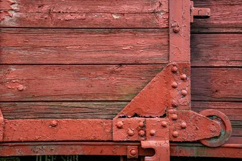 Details of an old rusty steam train weathered wood and metal components red Stock Photos