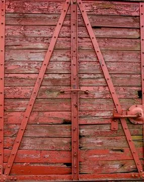 Details of an old rusty steam train cargo door in a weathered state, vintage Stock Photos