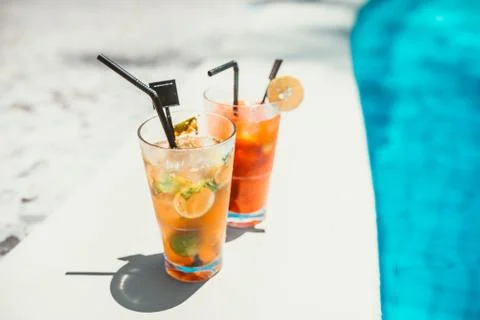 Details of refreshment drinks at pool bar served ice cold on a sunny day Stock Photos
