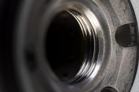 Details of a replaceable metal filter for cleaning engine oil in a car Stock Photos