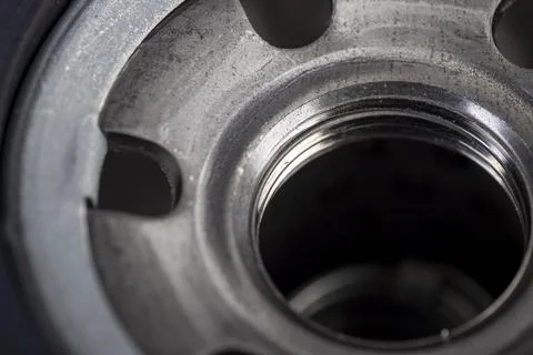 Details of a replaceable metal filter for cleaning engine oil in a car Stock Photos