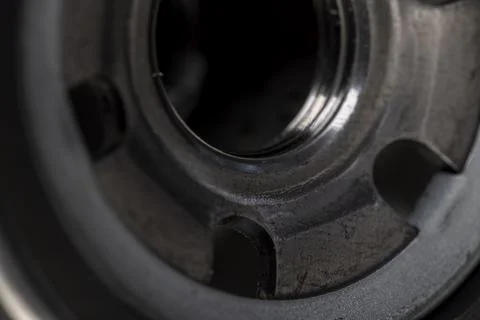 Details of a replaceable metal filter for cleaning engine oil in a car Stock Photos
