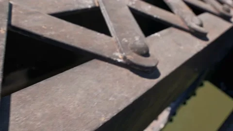 DETAILS OF RIVETS AND METALLIC STRUCTURE OF A BRIDGE Stock Footage 169160330