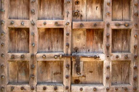 Details of a simple door with brass knobs Stock Photos