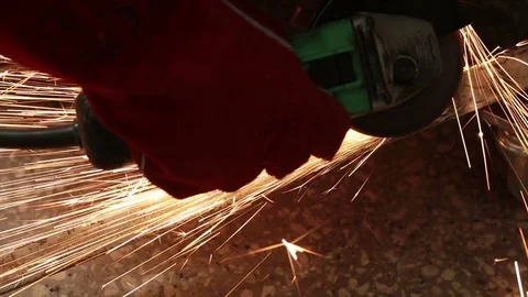 Details of Sparks from a Grinder Stock Footage 77688806