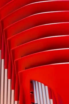 Details of stack red chairs from hard plasti Stock Photos