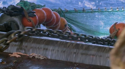 Details of the trawl, which rises out of the sea Stock Footage