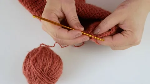 Detangles loops with small scissors.Craft and tailoring. Stock Footage 141100665