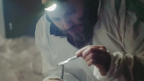 Detective Collects Evidence. Forensic Expert Examines Corroded Chain. Crime Stock Footage 346474993