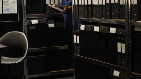 Detective inspector examining evidence Stock Footage 252154490