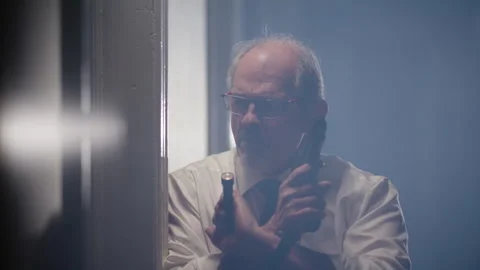 Detective kicking in a door during a police raid Stock Footage 267893353