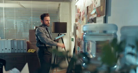 Detective, mind map and tablet with man in office for crime timeline, night or Stock Footage 314885649