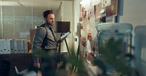 Detective, tablet and mind map with man in office for police records, evidence Stock Footage 314794402