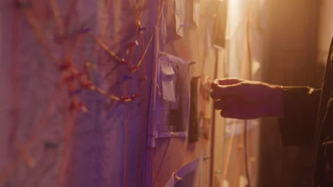A Detectives Hand Examining Evidence on ... | Stock Video | Pond5
