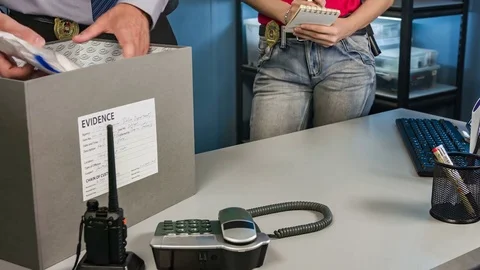 Detectives working with evidence, spread out of the box drugs Video stock 70513877