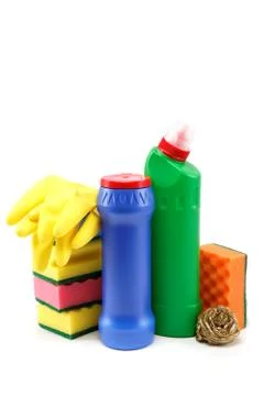Detergent bottles and cleaning sponge on a white background. Foto stock