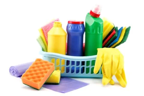 Detergent bottles, rubber gloves and cleaning sponge on a white background. Stock Photos